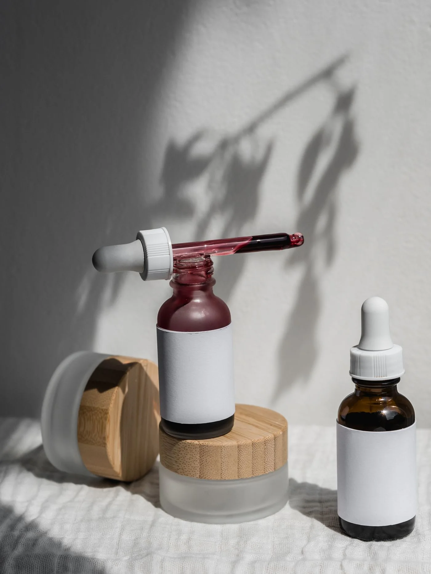 Simple skincare bottles in bright, natural light